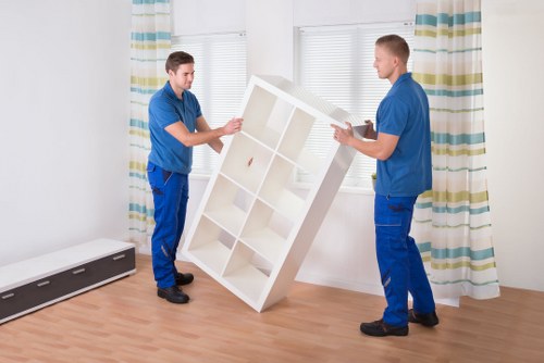 Staff preparing boxes and documents for an office move in Addington
