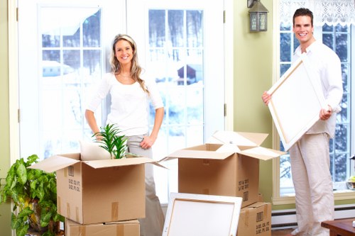 Packed household furniture inside an Addington storage unit